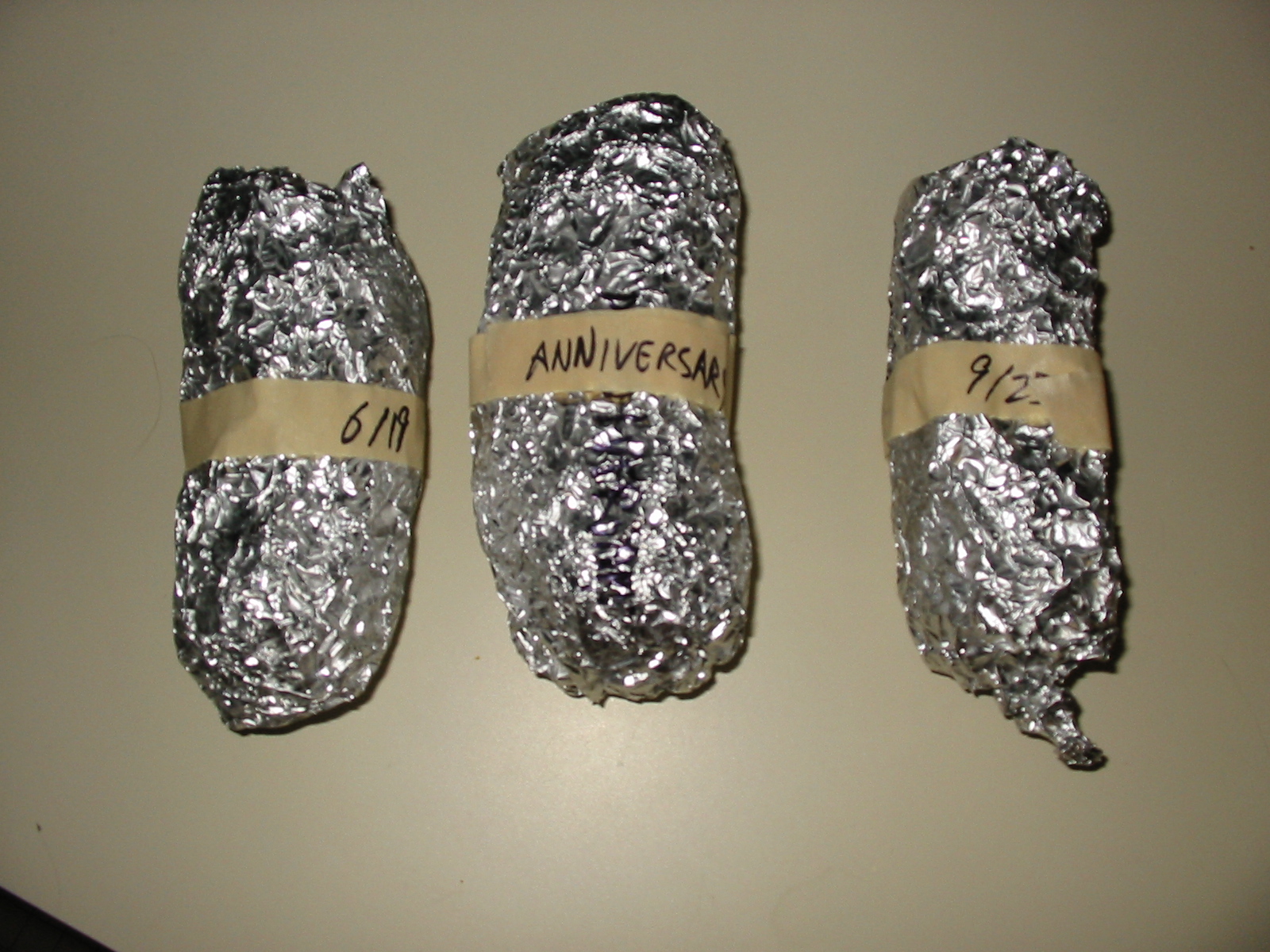 Ladylocks wrapped in aluminum foil and labeled