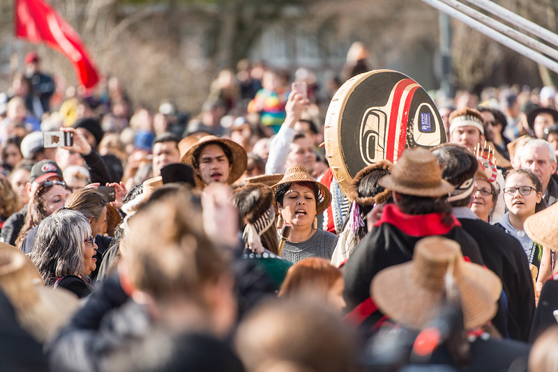 Totem pole raising ceremony