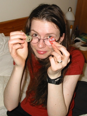 Rachel displays the safe deposit box key and engraved heart